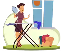 كي الملابس Ironing He is ironing his shirt for work.